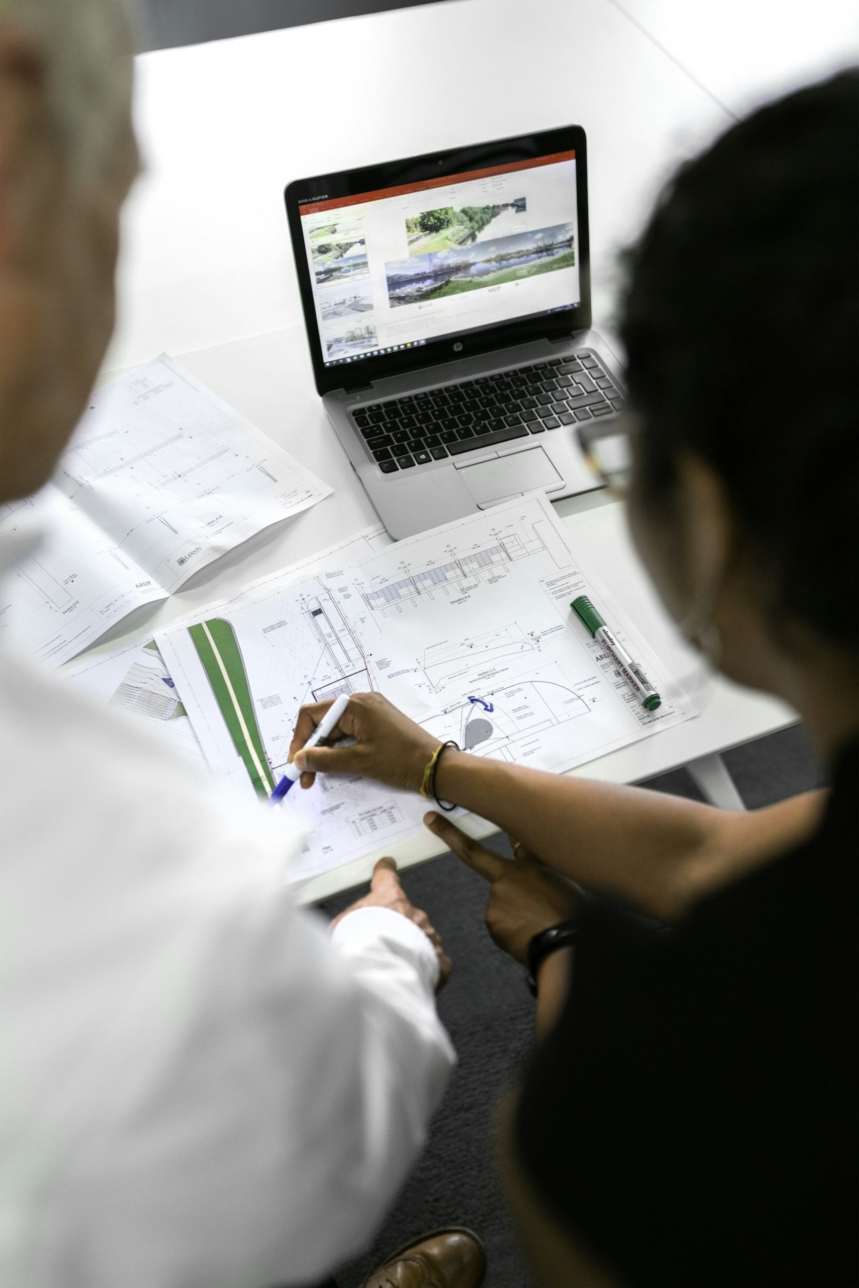Plans spread out on a table