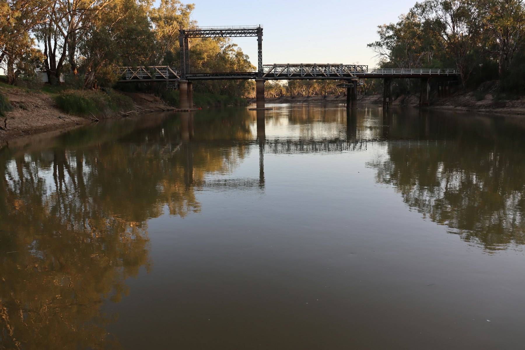 Bridge over calm river water