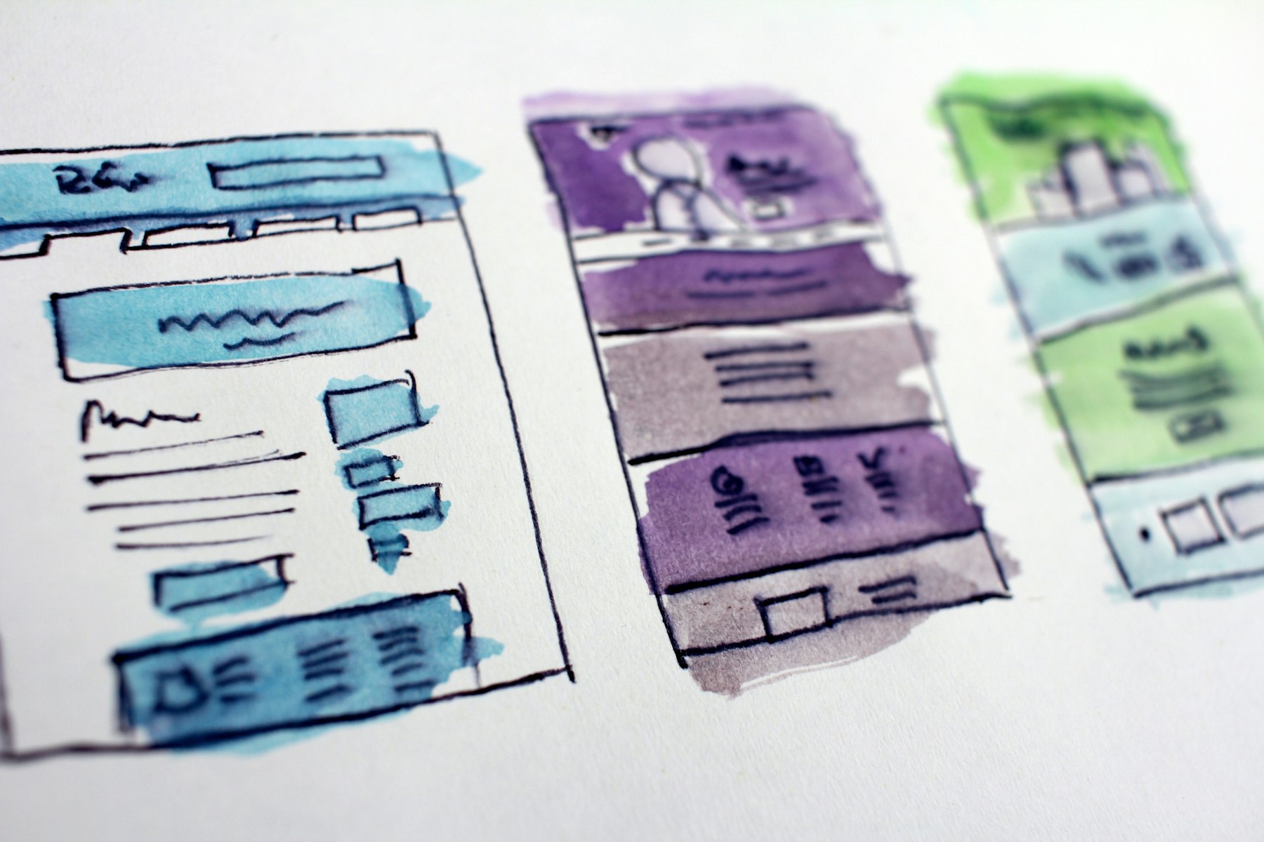 Website layout sketches on paper during planning